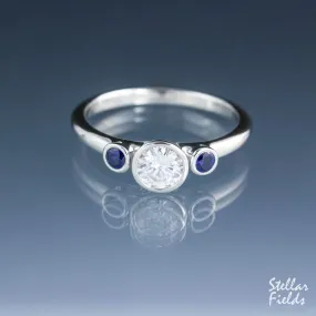 Three Stone Ring Bezel Engagement Ring Forever One Moissanite Cornflower Blue Sapphire